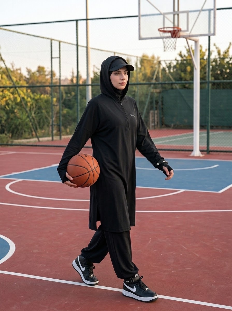 The black YALA Set, worn on a basketball court